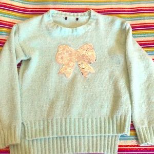 Girl’s mint green sweater